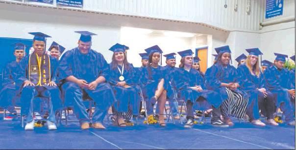 Chilton graduates took their last steps as students on Friday night during commencement.
