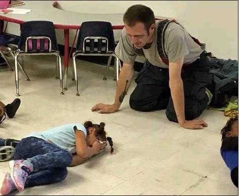 Star Rama | The Marlin Democrat<br />          This little one didn’t hesitate to show Chief Parker her fire safety skills.