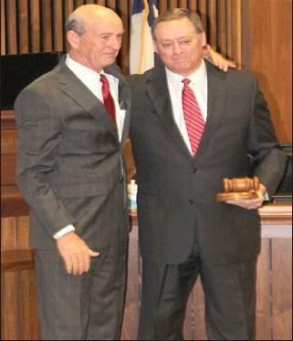 Dennis Phillips | Marlin Democrat          The 82nd District Judge Robert Stems swears newly elected District Judge Bryan F. Russ, Jr, in to office in Robertson County on January 1, 2019.