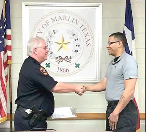 The Marlin Democrat<br />          Sergio Callazo being sworn in as a member of the Marlin Police Department in 2017 by former Chief of Police Michael Pesses.