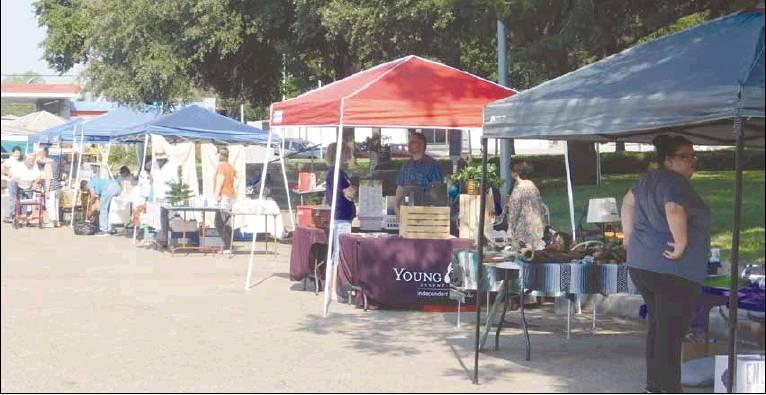 Raymond Moore | The Marlin Democrat<br />          Vendors and their booths getting ready for the September’s Vendor’s Market where anyone can come out and sell their goods to the public.