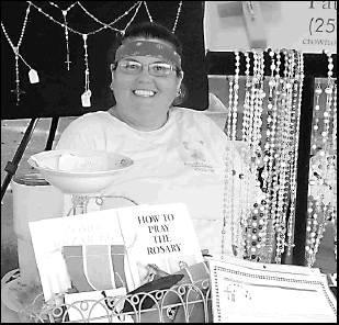 Pattie Pletzke is one of the main individuals behind the Marlin Vendors Market and loves selling her rosaries.