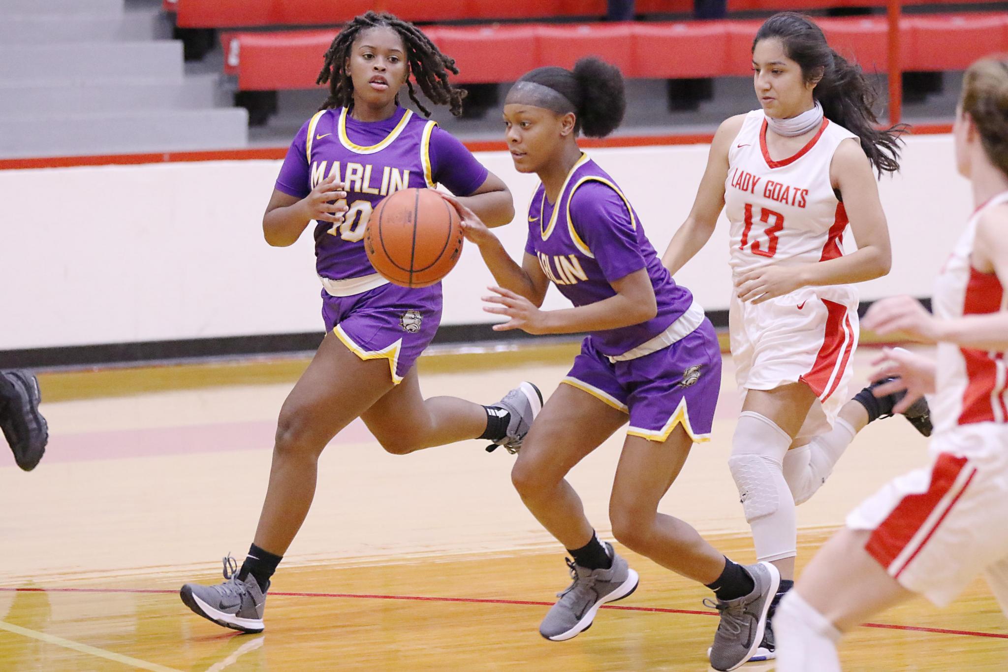 Marlin's Aniya Williams dribbles up the court against Groesbeck in a non-district game Friday night. The 6-foot-1 senior scored 23 points to lead the Lady Bulldogs to a 59-47 victory.Photo by Angela Crane/For the Marlin Democrat