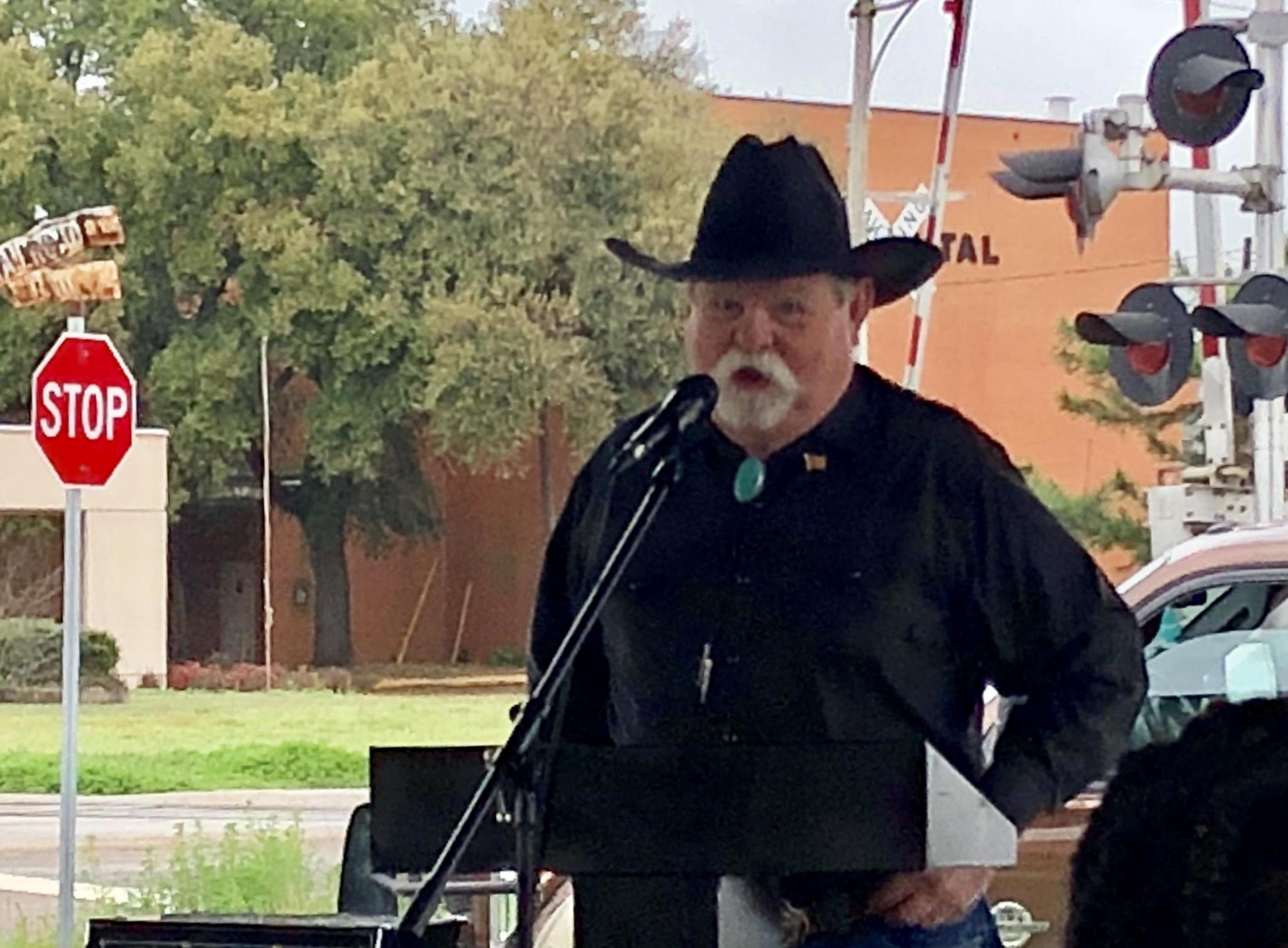 Ol Jim Cathey recited "Ragged Old Flag" by Johnny Cash.