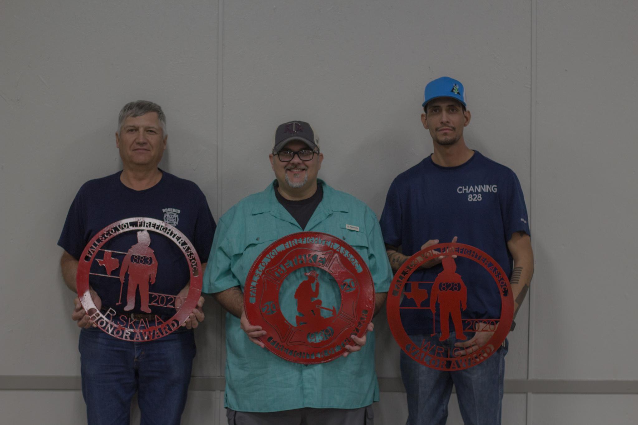From left, Raymond Skala (Honor), Michael Behke (Fire Fighter of the Year), and Channing Wright (Valor) received personalized metal decals at the Falls County First Responders Dinner.
