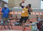 Brysen Maxwell-Steele throws in the shot put on the way to an 8th place finish at the state championship