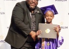 Scarlett T. Lang-Johnson receives her Kindergarten diploma. Photo Submitted by Lang Danese