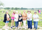 L-R At the Western Belle Family Farm Strawberry Festival were Community Garden Club members Angel Butler, Chelleye Crow, Beth Mullins, Terri Glover, Letitia Estep, Bettye Tarver and Samenthia Milnes. Photo by C. Parrott L-R At the Western Belle Family Farm Strawberry Festival were Community Garden Club members Angel Butler, Chelleye Crow, Beth Mullins, Terri Glover, Letitia Estep, Bettye Tarver and Samenthia Milnes. Photo by C. Parrott