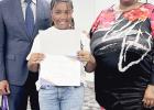 Acting Superintendent Norman Jones, Director of Academics Tamika Washington, and the Lone Star Governance Student of the Month, 4th grader Embrie Coleman. Photo by Elizabeth Richardson/Marlin Democrat