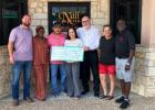 From left to right: Will Roe (Secretary, EDC), Hermetta Paul (Vice President, EDC), Peter Lam (Team Member), Tuen Nguyen (Owner), Dr. John Barrett (President, EDC), Melissa Mahoney (Treasurer, EDC), Jimi Lynn (EDC Board Member). Contributed photom