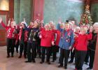 Before social distancing requirements, chorus members performed throughout the community. Here they are singing at the Santa Fe Depot last December.