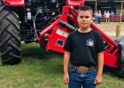 Maverick Cannon, age 9, son of Liz and Maverick Cannon awarded belt buckle: Junior Showmanship 2020 at the Falls County Junior Fair. California Rabbit, white 1st time time showing the rabbit.